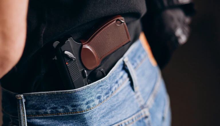 handsome-man-actor-posing-in-studio-with-weapon-e1657795423410-768x442